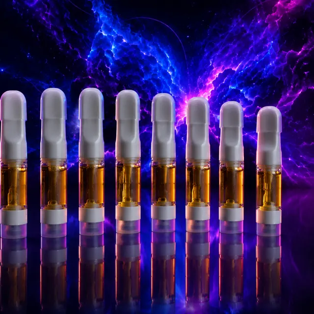 A row of hemp vape cartridges filled with amber extract, against a violet nebula